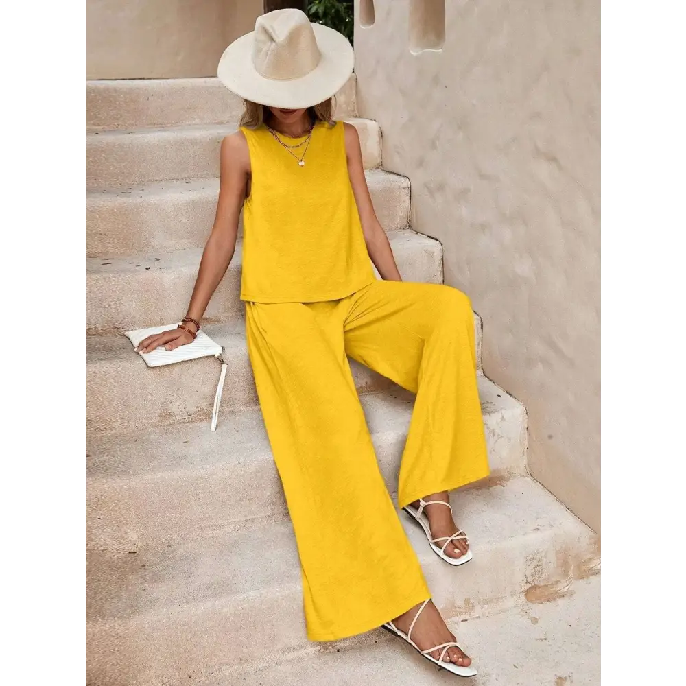 Bright yellow casual loose pants set with sleeveless top designed for comfortable everyday wear and relaxed fit
