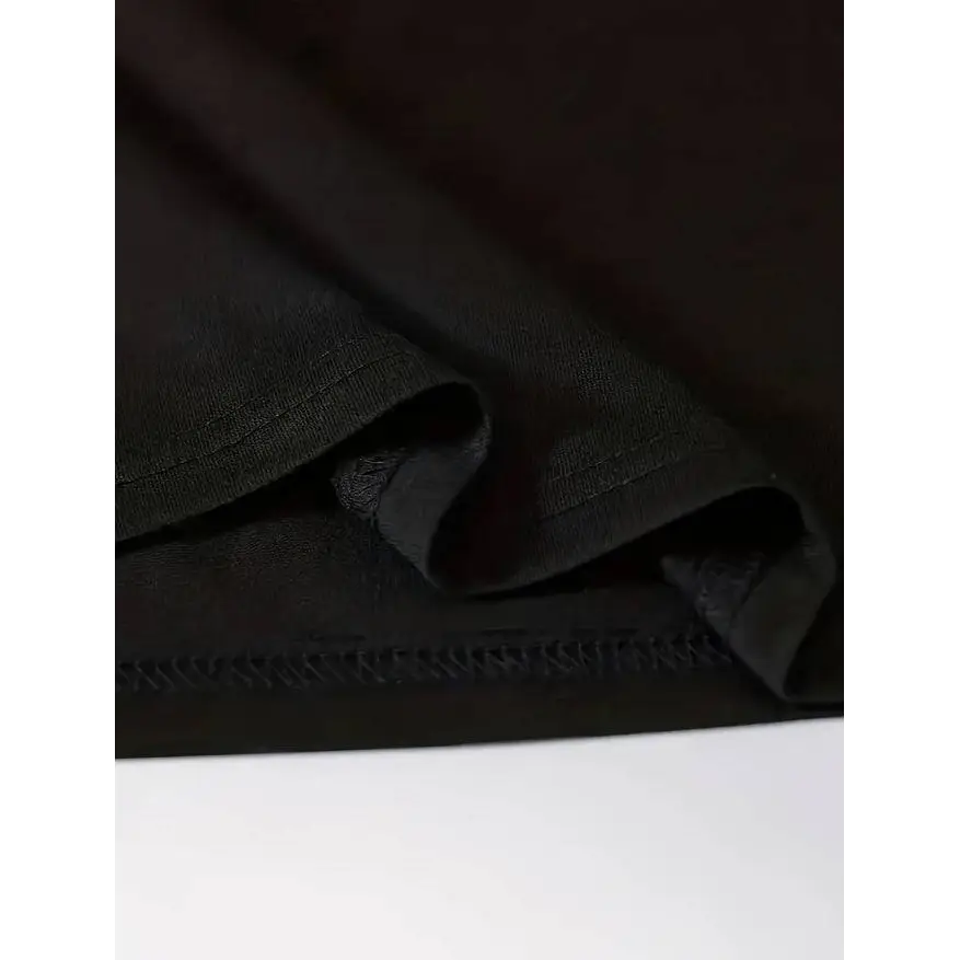 Black christmas vibes print t-shirt made of smooth black fabric with neat stitching along the hem