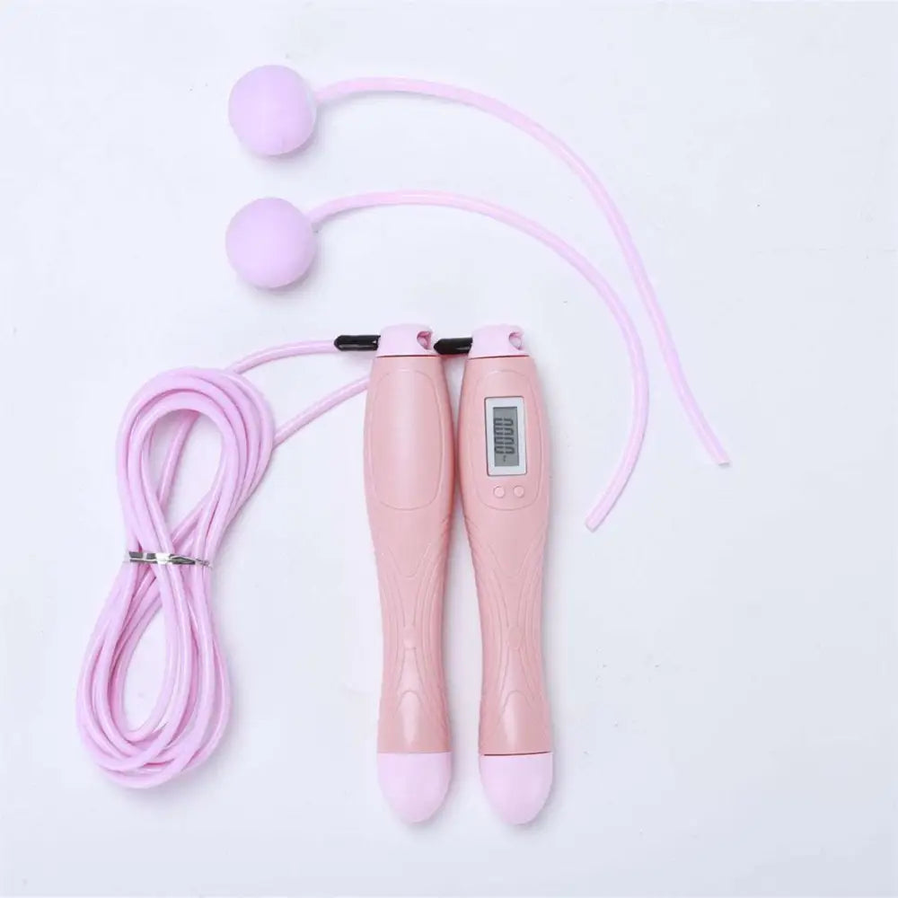 Pink cordless electronic skipping rope with rounded handles and digital display for skipping rope workouts