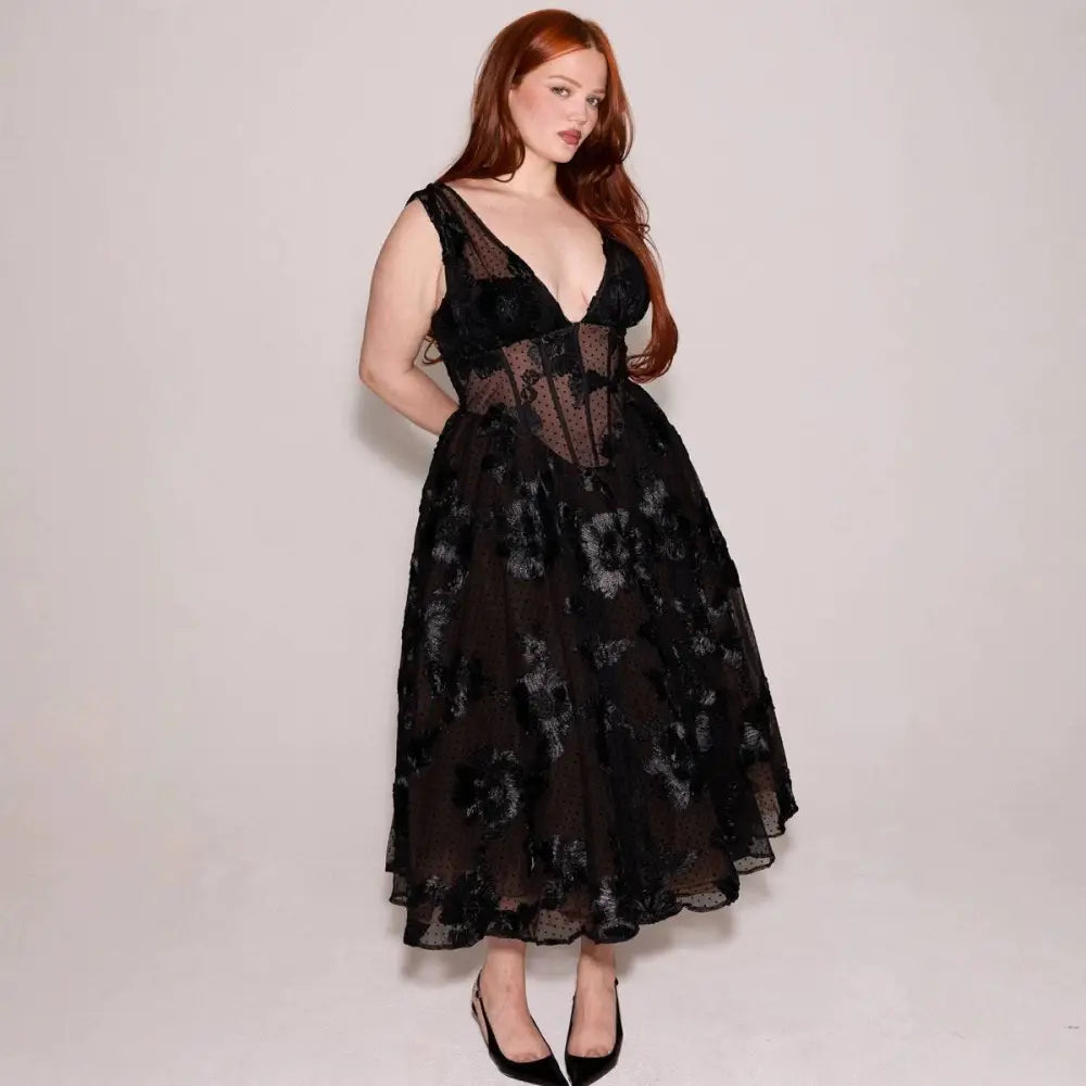 Black deep v-neck lace mesh evening dress with floral embroidery and sheer bodice in black lace midi style