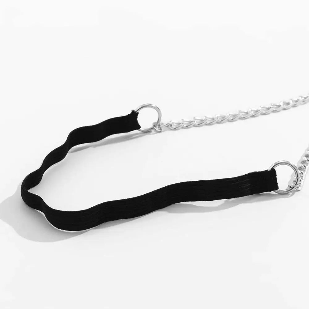 Black elastic geometric body chain thigh garter featuring black velvet choker with silver chain links and metal rings
