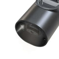 Black cylindrical electric kitchen household grinder housing with matte finish and visible internal components