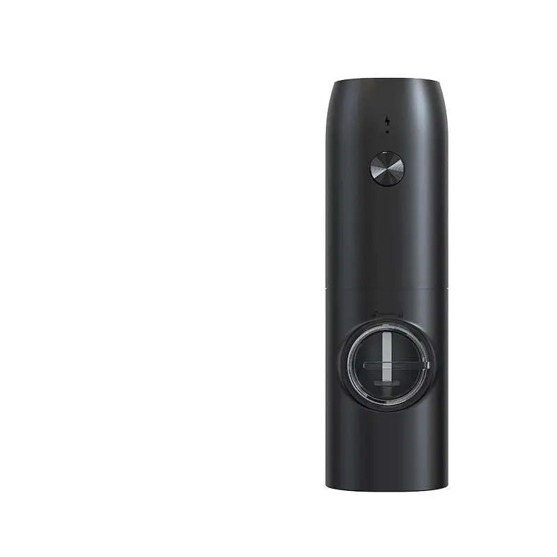 Black cylindrical portable electric kitchen household grinder with metallic button and transparent hopper for grinding