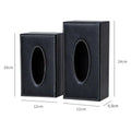 Black faux leather car tissue box cover with white stitching and oval cutout for easy tissue access