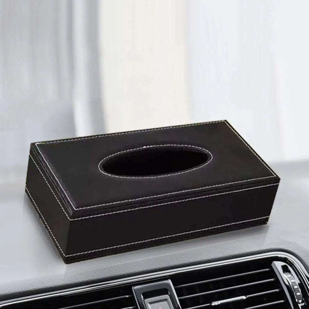 Black faux leather car tissue box cover with white stitching and central oval opening for easy tissue access