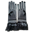 Black fishnet stretch mesh gloves with lace cuffs and black ribbons showcasing a pair knitted stretch mesh design