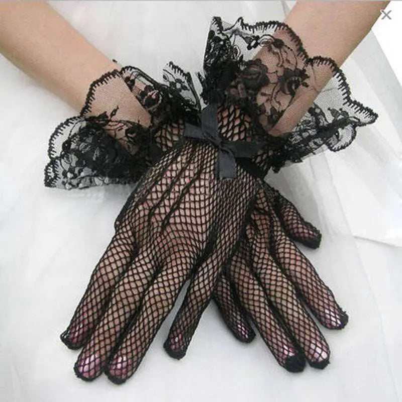 Black fishnet stretch mesh gloves with floral lace cuffs and satin bow pair knitted stretch mesh design