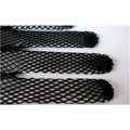 Black fishnet stretch mesh gloves with lace cuffs featuring knitted stretch mesh and frayed edges