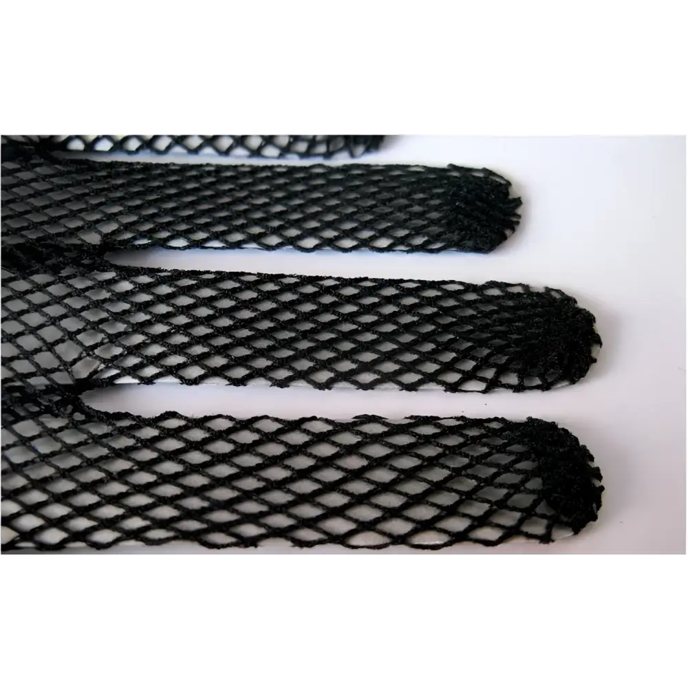 Black fishnet stretch mesh gloves with lace cuffs featuring knitted stretch mesh and frayed edges