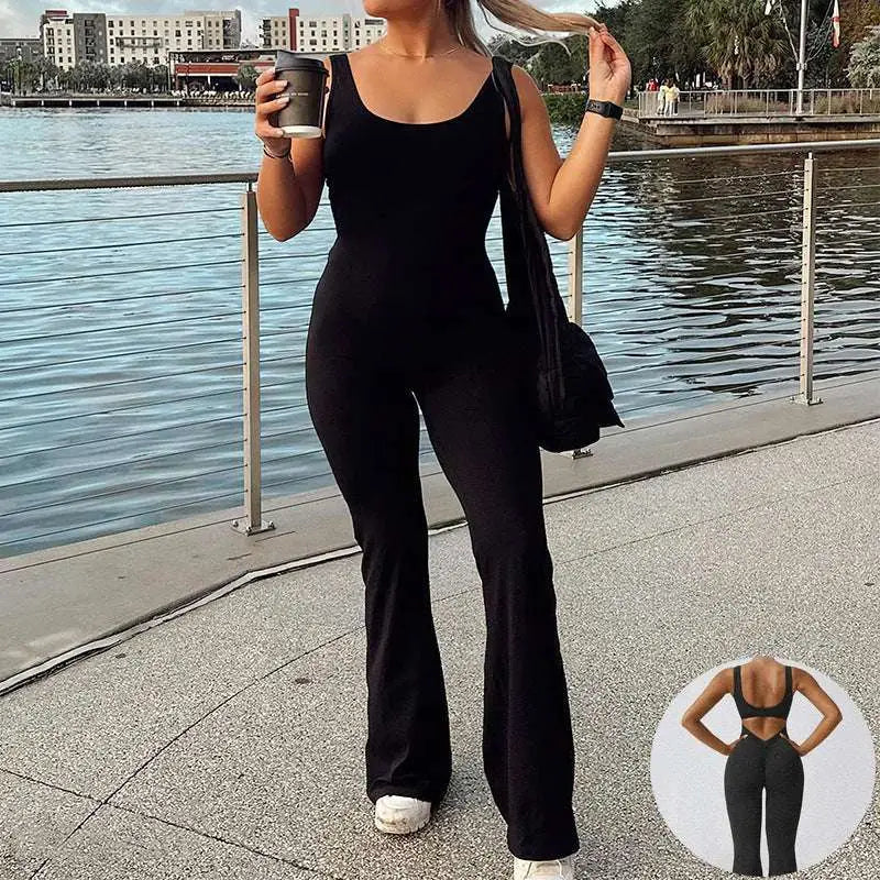 Black flared slim fit hip raise jumpsuit with stretchy fabric and square neckline for a sleek silhouette