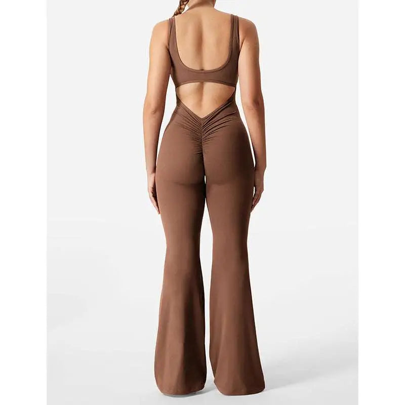 A sleek chocolate-brown slim fit hip raise jumpsuit with ruched waist and back cutout in black flared slim design