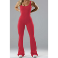 A vibrant red slim fit hip raise jumpsuit with a scoop neckline and flared legs, contrasting the black flared slim style
