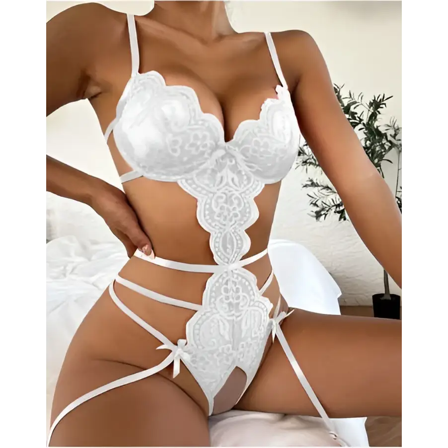 White lace transparent bodysuit pajamas with intricate floral patterns and delicate straps for elegant lingerie wear