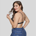 Black floral plus size lace bra with thin adjustable straps and a supportive band in black lace material