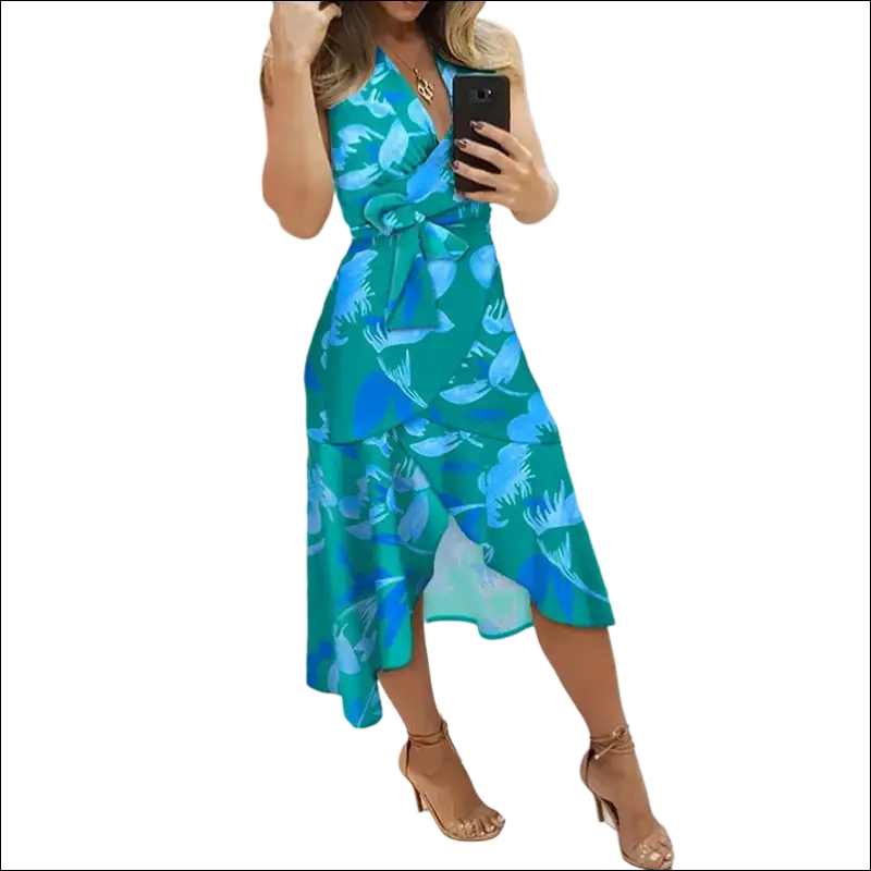 Black floral slim fit wrap dress in vibrant teal and blue floral print with a ruffled hemline slim fit dress