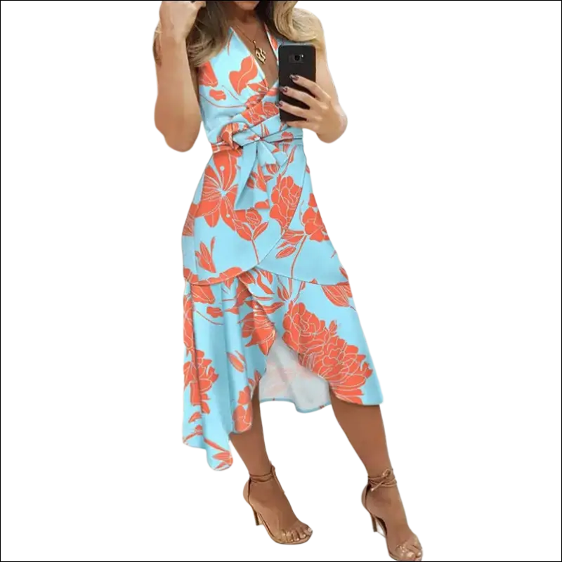Light blue slim fit wrap floral dress with vibrant orange patterns and a cinched waist tied in a bow