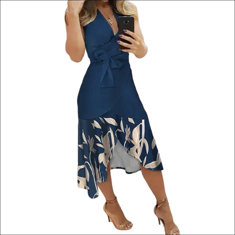 Navy blue slim fit floral dress with white and gray leaf pattern, asymmetrical hemline, and matching waist belt