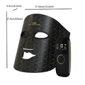 Black geometric photon beauty mask with led lights and matching control unit for skin firming skincare routine