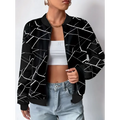 Black geometric sleeveless casual fit jacket featuring a black bomber style with bold white geometric pattern and ribbed cuffs