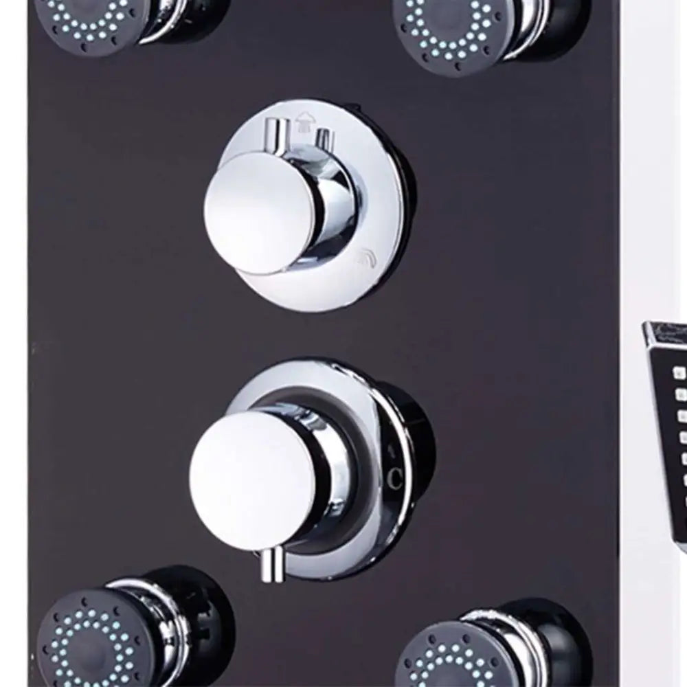 Chrome-finished shower control panel with circular knobs and black-faced spray heads on black glass shower with rain showerhead and massage jets