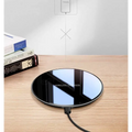Black glossy 15w smooth wireless charger with a circular design, glossy finish, and subtle white text branding