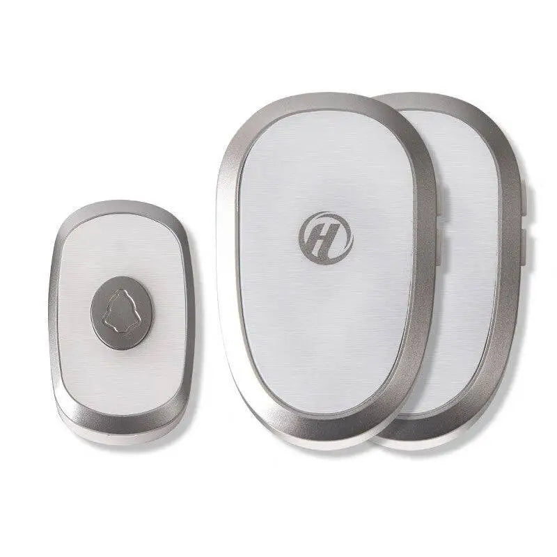 Silver-framed gold doorbell wireless home system with oval shape brushed metal finish and modern wireless home design