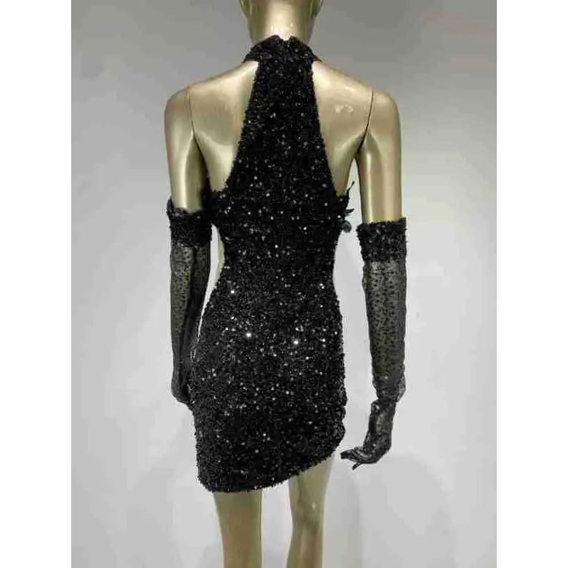 Black halter feather short mini dress featuring black sequined fabric with feather shoulder accents and sheer long sleeves