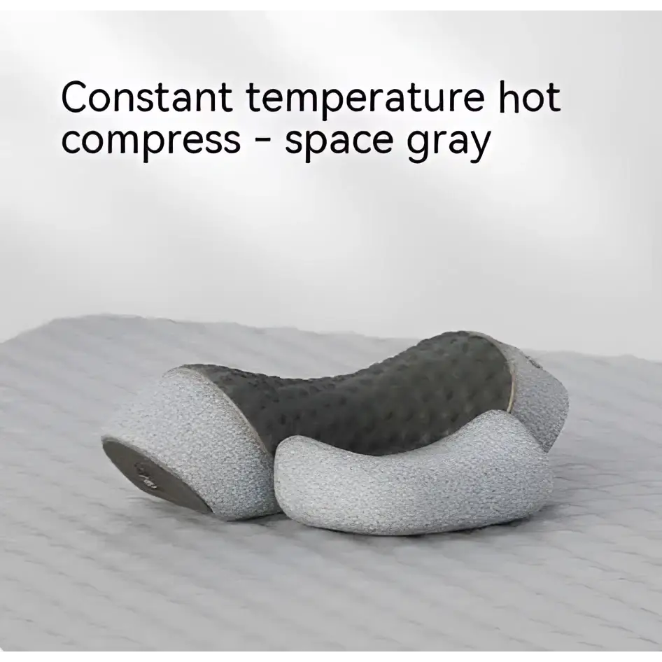 Space gray heated cervical pillow with constant temperature hot compress and textured segmented design for neck support