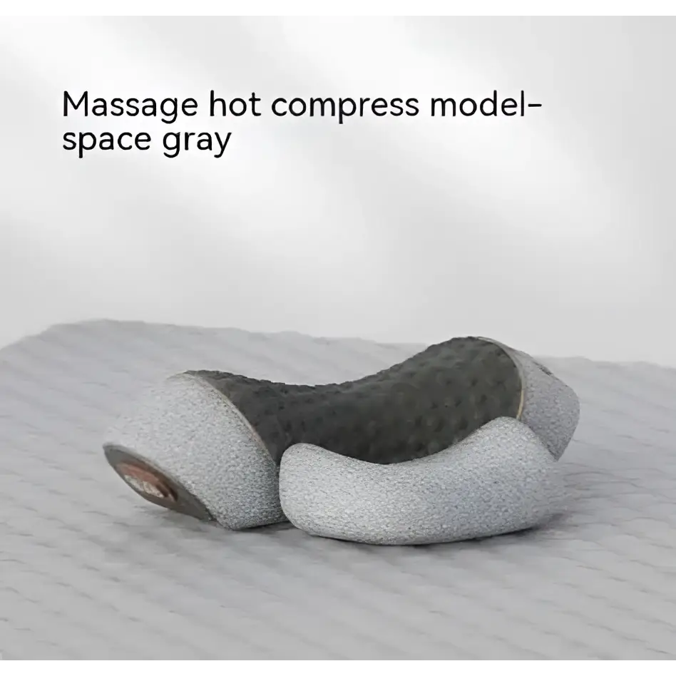 Gray massage hot compress pillow with textured cushioned surface and contoured design for neck support in black heated cervical pillow wrap
