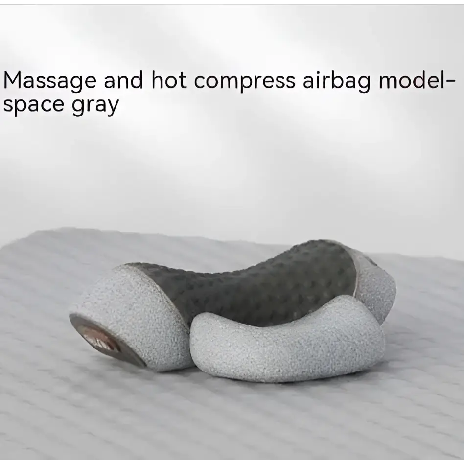 Gray massage and hot compress airbag with textured cushion design in black heated cervical pillow neck support wrap