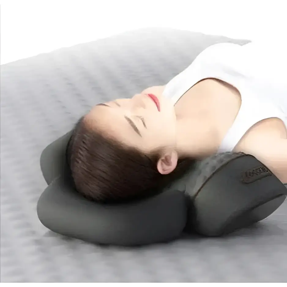 Black heated cervical pillow made of memory foam with contoured design and subtle brand logo for neck support wrap