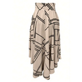 Black high waist daily slit midi skirt in beige fabric with bold black geometric lines and flowing silhouette