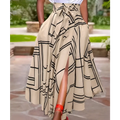 Beige high waist midi skirt with black geometric pattern and tied waistband ideal for daily slit midi wear