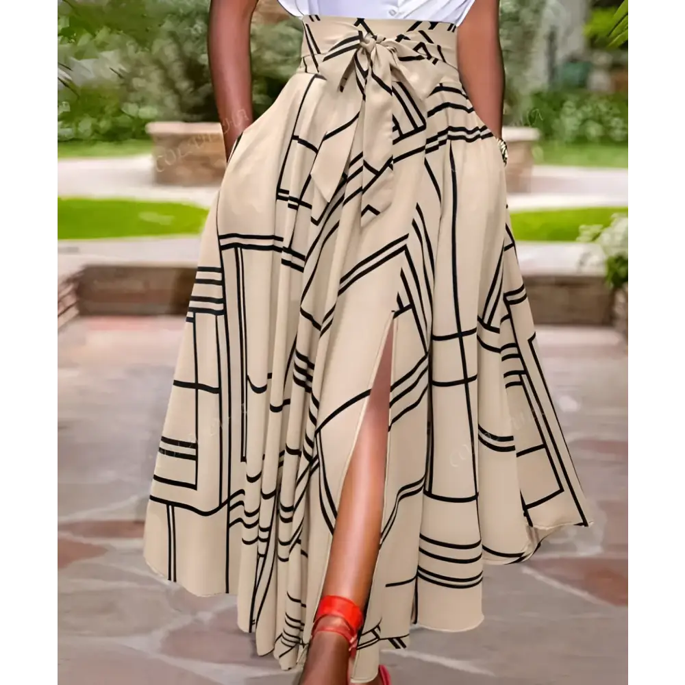 Beige high waist midi skirt with black geometric pattern and tied waistband ideal for daily slit midi wear