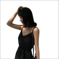 Black lace camisole with lace trim and spaghetti straps in luxury women’s fashion for elegant layering