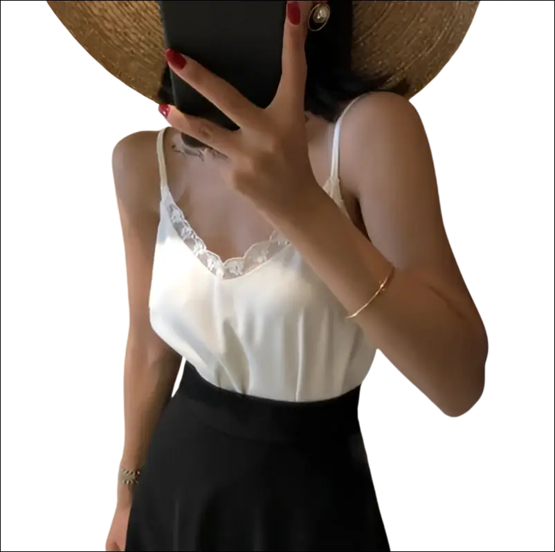 White lace-trimmed lace camisole with spaghetti straps in luxury women’s fashion for elegant layered looks