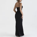 Black lace high waist mermaid gown in satin with thin spaghetti straps showcasing elegant evening wear design