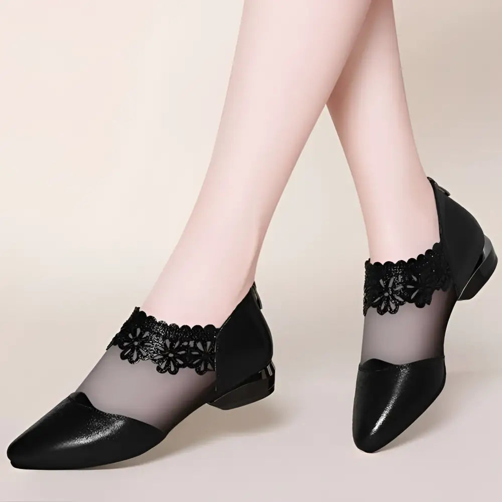 Black lace mesh women’s sandals with glossy leather toe and transparent mesh overlay on low block heel