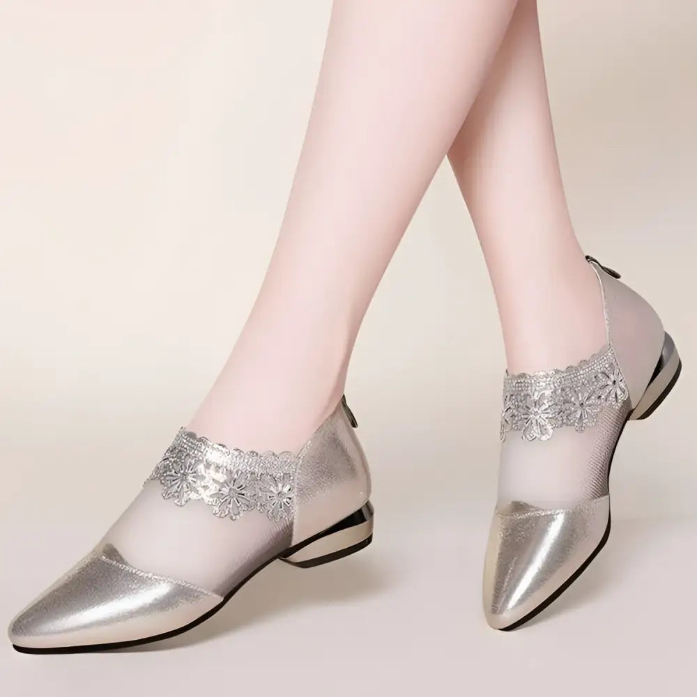 Silver metallic mesh women’s flats with delicate black lace mesh trim and glossy leather toe for elegant wear