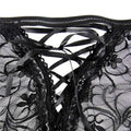 Black lace plus size sexy lingerie garter set with intricate floral bodice and crisscross satin ribbon ties american plus size