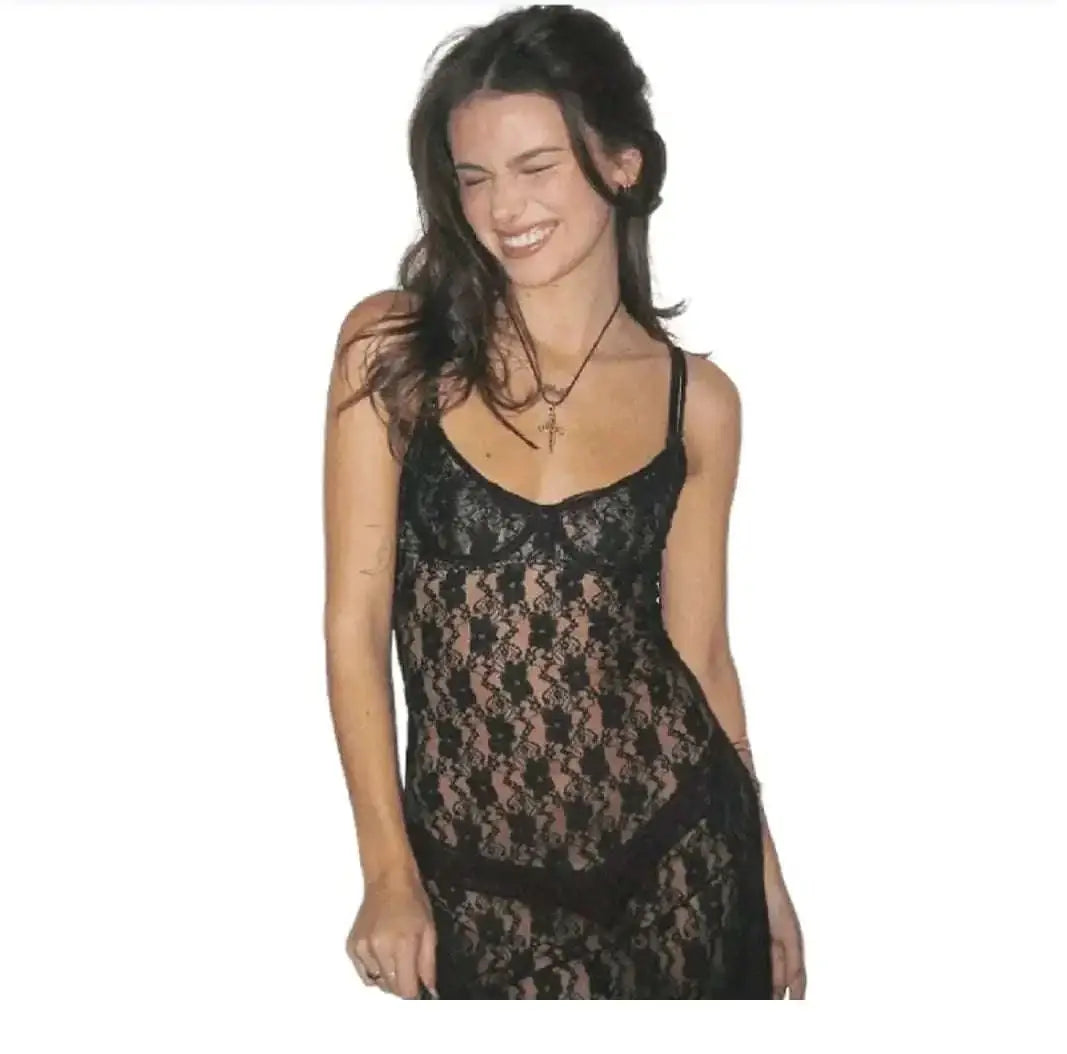 Black lace slip dress featuring delicate floral lace patterns and thin spaghetti straps ideal for plus size lingerie sets in the 2026 guide.