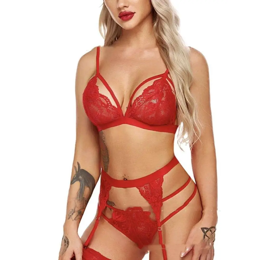 Red lace lingerie set with intricate floral patterns and thin straps complementing black lace underwear suspenders