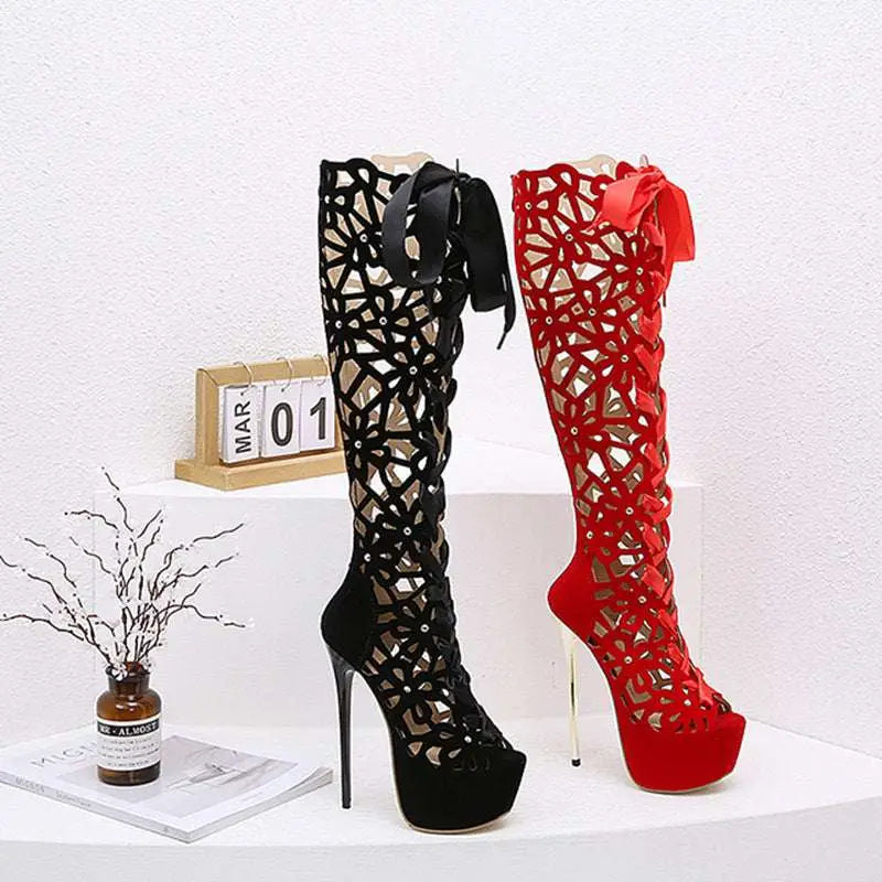 Black lace-up peep toe high heels featuring floral cutout patterns and satin ribbon ties on platform heels
