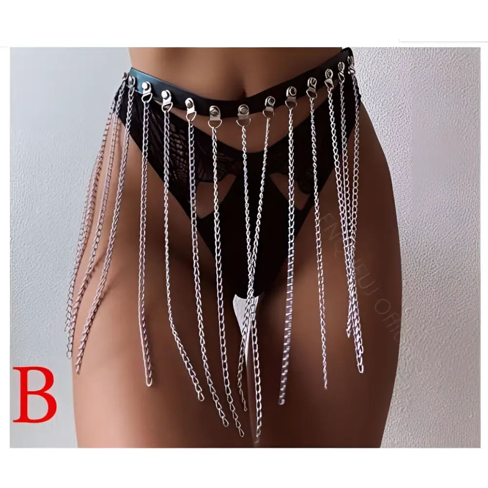 Black leather harness chain tassel belt featuring silver chain fringe and decorative metal clasps on waistband
