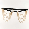 Black leather harness chain tassel belt featuring multiple cascading gold-toned chain layers for stylish wear