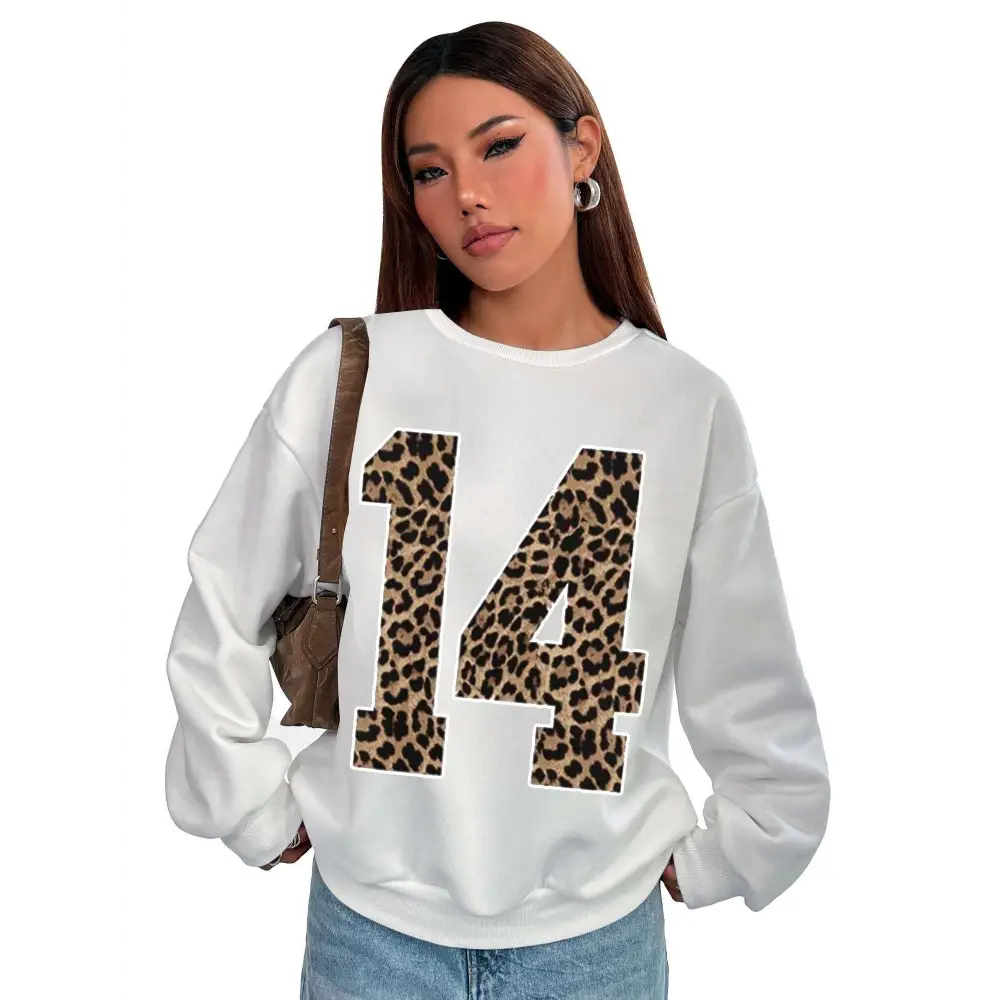White crew neck sweatshirt featuring bold black leopard number 14 with leopard print number design on front