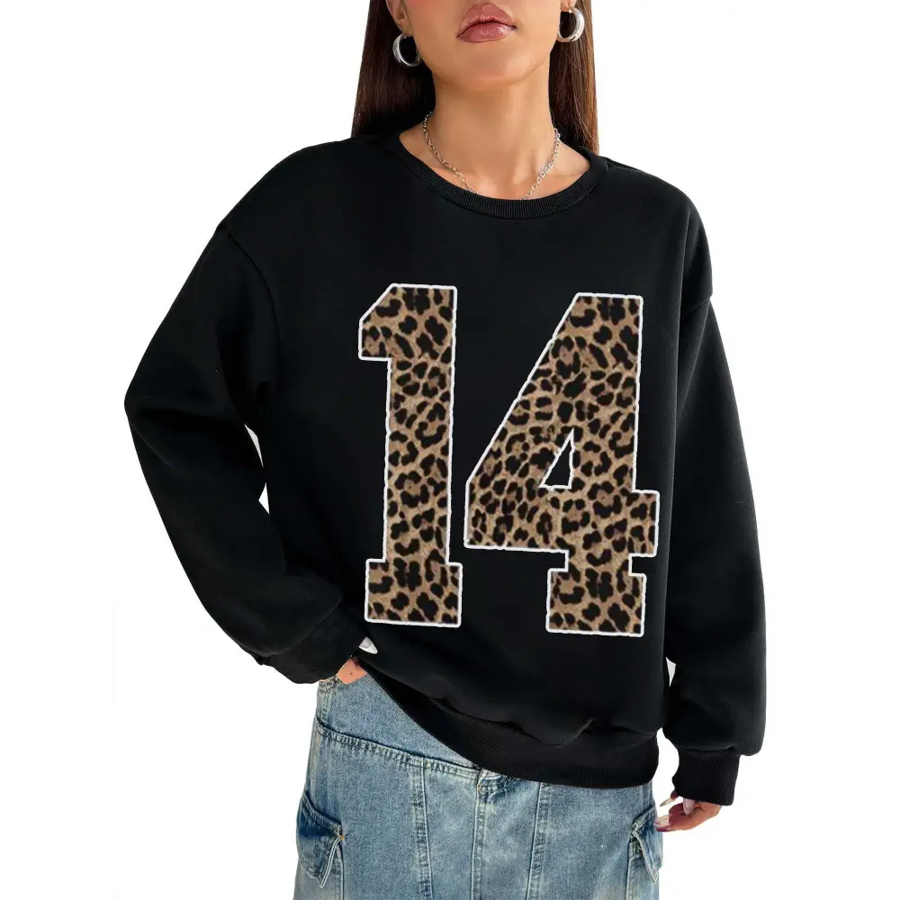 Black crew neck sweatshirt featuring a bold leopard print number 14 with white trim for casual wear