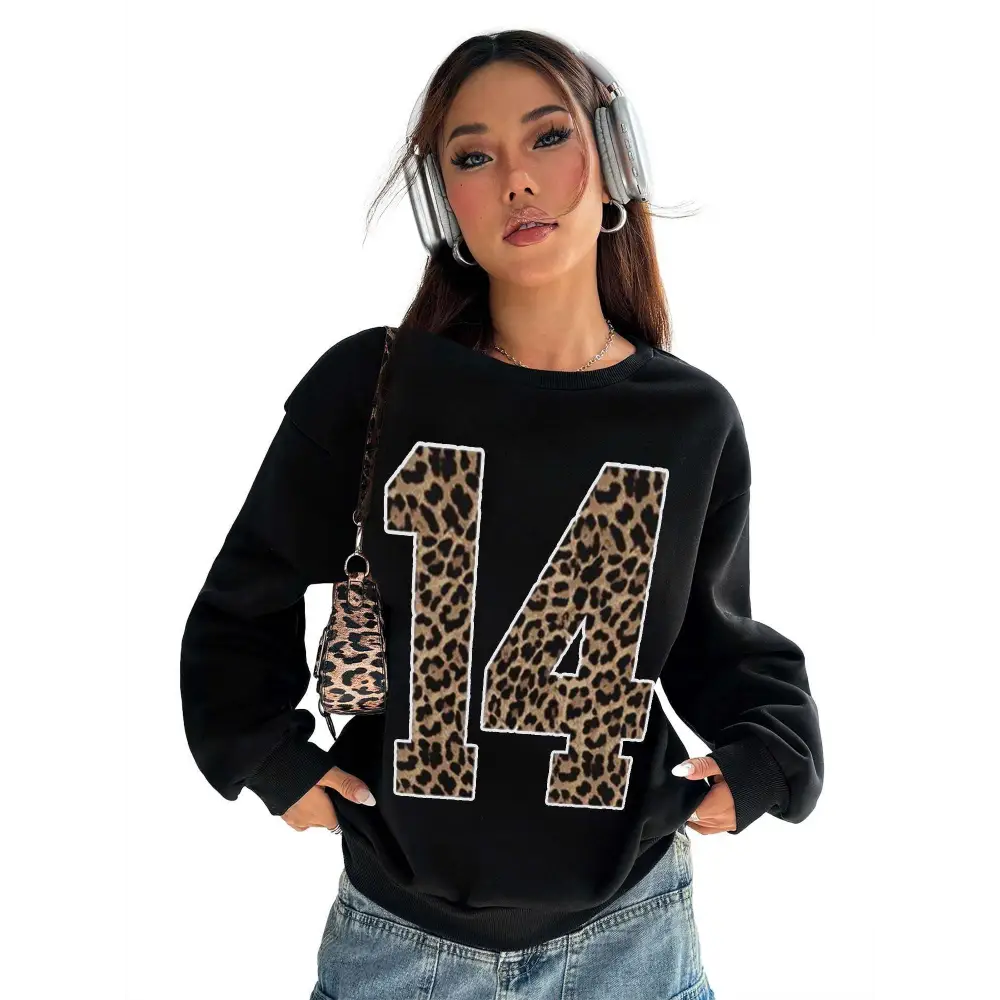 Black crew neck sweatshirt featuring a bold leopard print number 14 appliquéd across the front