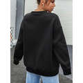 Black oversized crew neck sweatshirt with ribbed cuffs and hem featuring black leopard number 14 design