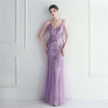 Lavender sequined mermaid gown with sheer illusion sleeves and fitted bodice for black mesh beaded bridal wedding dinner